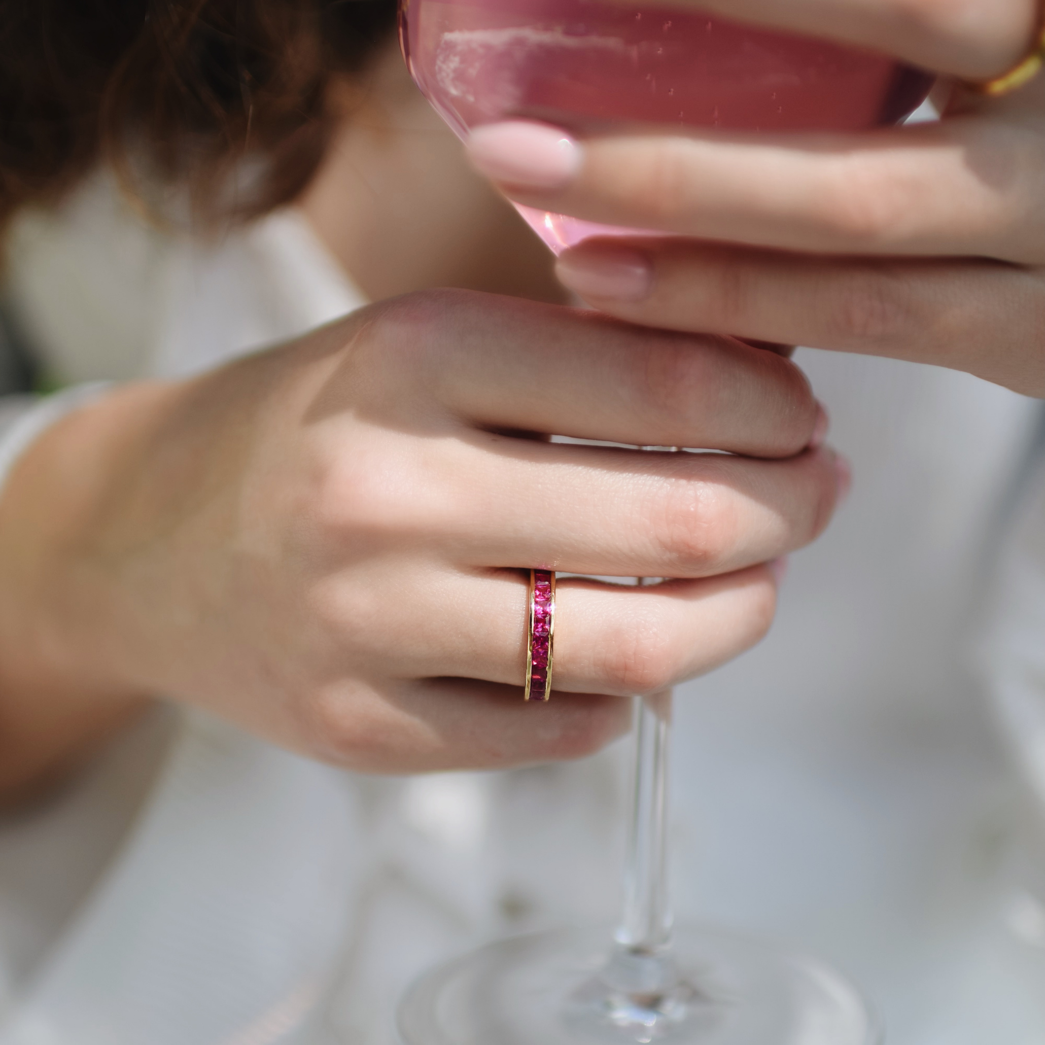 The Promise Ring Co. Ruby Channel set band diamond ring. With no prongs for a seamless look. Stacked or left alone to sparkle, this ring always looks beautiful. Shop in Ruby Simulant & 18ct Gold Vermeil